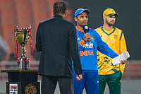 India Vs South Africa, 2nd T20I: See Best Photos From Mullanpur | Photo: PTI/Shiva Sharma : India’s captain Suryakumar Yadav, center, and South Africa’s captain Aiden Markram, right, during the toss before the second T20 International cricket match of a series between India and South Africa, at Maharaja Yadavindra Singh International Cricket Stadium, in New Chandigarh.