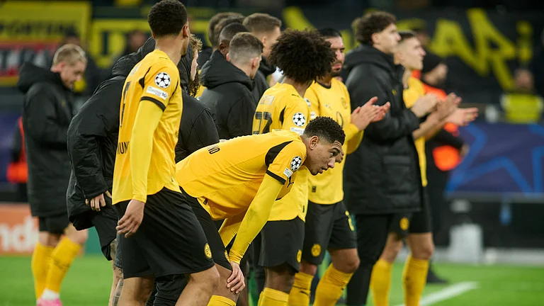 Borussia Dortmund's Jobe Bellingham reacts after the UEFA Champions League opening phase match against Bodo/Glimt on December 10, 2025. - | Photo: AP/Bernd Thissen