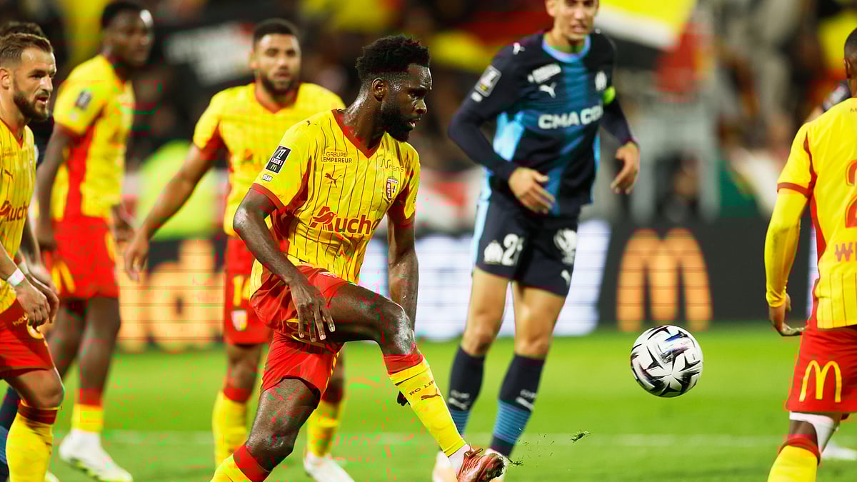 Lens' Odsonne Edouard kicks the ball during the French League 1 match against Marseille on October 25, 2025.  - | Photo: AP/Jean-Francois Badias