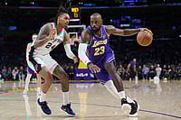 NBA Cup: San Antonio Spurs Stun LeBron James, LA Lakers In QFs | Photo: AP/Jae C. Hong : Los Angeles Lakers forward Lebron James (23) drives past San Antonio Spurs guard Devin Vassell (24) during the first half of an NBA Cup basketball game in Los Angeles.