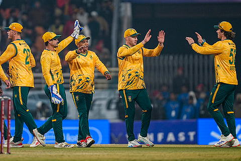 South Africa's players celebrate the wicket of India's Hardik Pandya during the second T20 International cricket match of a series between India and South Africa, at Maharaja Yadavindra Singh International Cricket Stadium, in New Chandigarh.