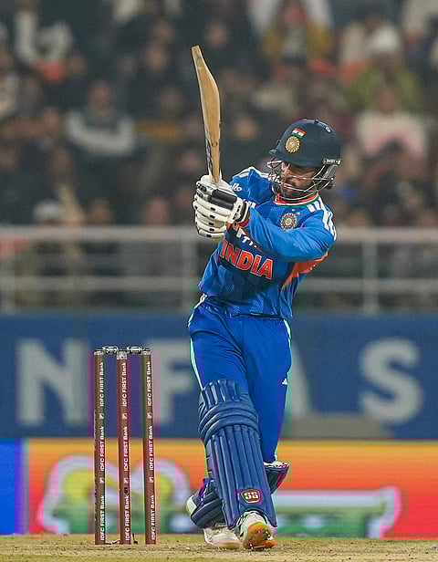 India's Tilak Varma plays a shot during the second T20 International cricket match of a series between India and South Africa, at Maharaja Yadavindra Singh International Cricket Stadium, in New Chandigarh.
