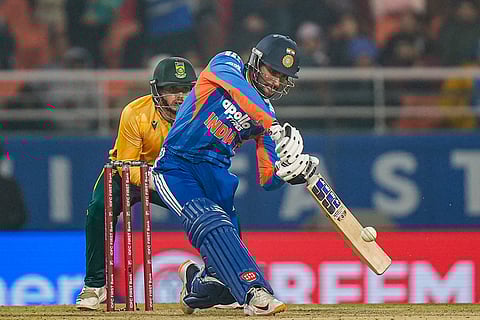 India's Tilak Varma plays a shot during the second T20 International cricket match of a series between India and South Africa, at Maharaja Yadavindra Singh International Cricket Stadium, in New Chandigarh.