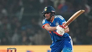 | Photo: AP/Rafiq Maqbool : India's Shubman Gill plays a shot during the first T20 International cricket match between India and South Africa in Cuttack, India.