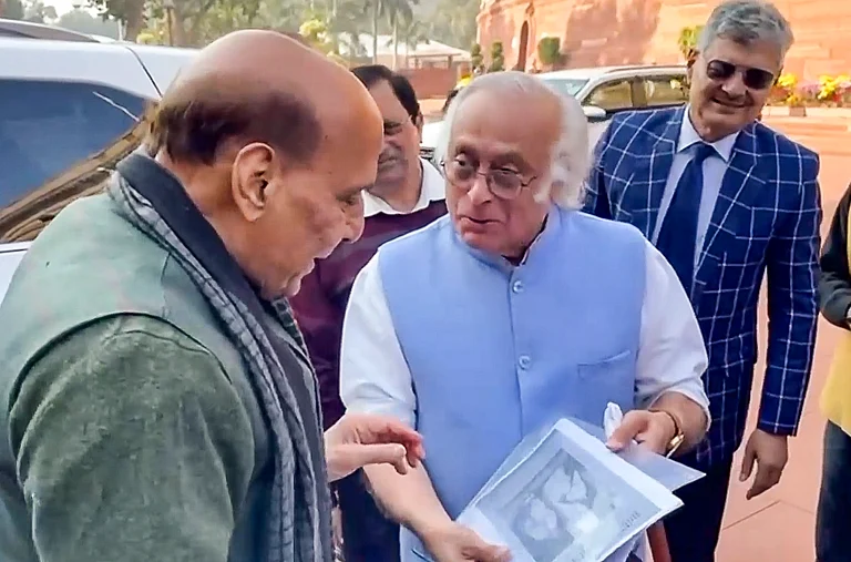 Ramesh reached Singh as he stepped out of his car at the Makar Dwar and told him he had brought the diary pages in Gujarati. - PTI