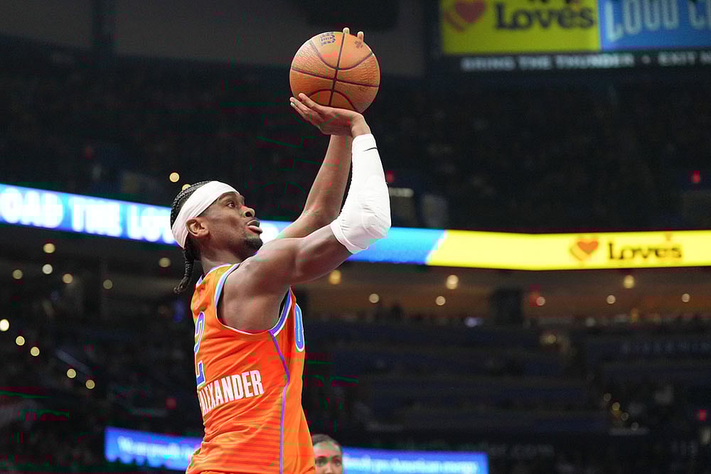Oklahoma City Thunder guard Shai Gilgeous-Alexander shoots during the second half of an NBA Cup basketball game against the Oklahoma City Thunder in Oklahoma City. - | Photo: AP/Kyle Phillips