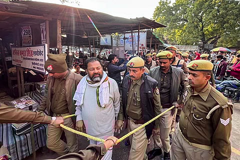 Police take an accused to present him in the Bahraich court in connection with the violence that occurred during idol immersion in the Maharajganj area, in Bahraich.