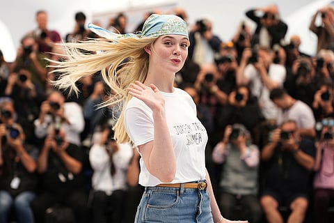 Elle Fanning poses for photographers at the photo call for the film 'Sentimental Value' at the 78th international film festival, Cannes, southern France, May 22, 2025. 