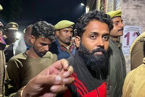 Police take Sarfaraz after presenting him in the Bahraich court in connection with the violence that occurred during idol immersion in the Maharajganj area, in Bahraich. Sarfaraz was later convicted in the case and sentenced to death.