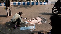 Lionel Messi GOAT Tour Of India 2025 Preview: High-Voltage Spectacle Without The Football | Photo: AP/Bikas Das : Indian artist Swapan Das paints a portrait of Argentine football star Lionel Messi on street in anticipation of his visit to the city in Kolkata on December 12, 2025.
