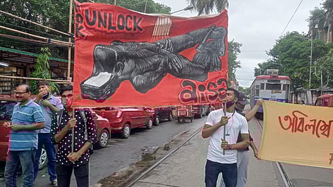 Hok Unlock Protest Banner