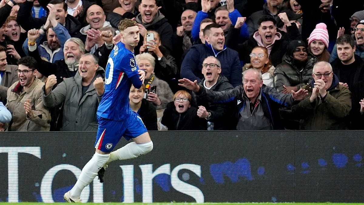 Chelsea's Cole Palmer celebrates after scoring his sides first goal during the English Premier League soccer match between Chelsea and Everton in London, Saturday, Dec. 13, 2025. - (Adam Davy/PA via AP)