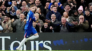 (Adam Davy/PA via AP) : Chelsea's Cole Palmer celebrates after scoring his sides first goal during the English Premier League soccer match between Chelsea and Everton in London, Saturday, Dec. 13, 2025.
