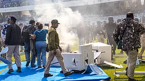 PTI : Smoke erupts after chairs were set on fire amid chaos during Lionel Messi's GOAT India Tour 2025 at Vivekananda Yuba Bharati Krirangan in Kolkata.