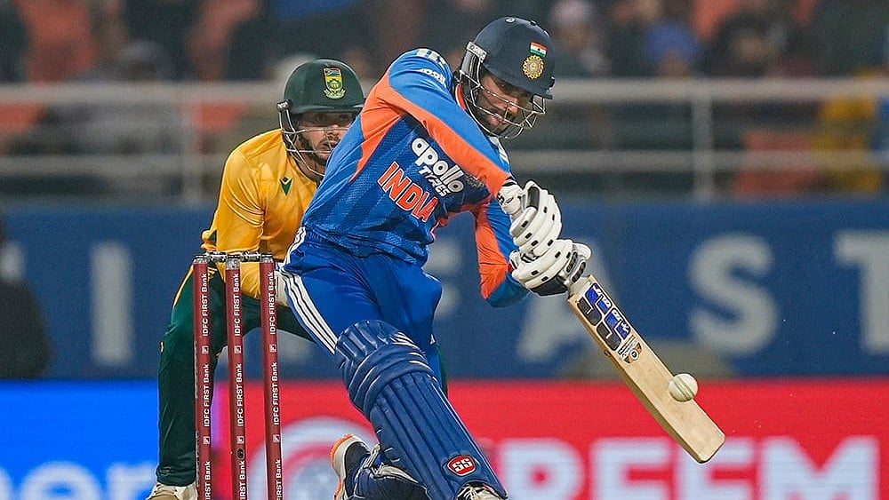 | Photo: PTI/Shiva Sharma : India's Tilak Varma plays a shot during the second T20 International cricket match of a series between India and South Africa, at Maharaja Yadavindra Singh International Cricket Stadium, in New Chandigarh.