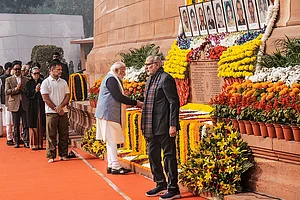 | Photo: PTI/Shahbaz Khan : Prime Minister Narendra Modi pays tribute to the martyrs of the 2001 Parliament attack during a ceremony to mark its 24th anniversary, at Samvidhan Sadan, in New Delhi. Vice President CP Radhakrishnan and LoP in the Lok Sabha Rahul Gandhi are also seen.