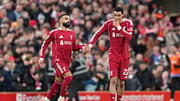 (AP Photo/Jon Super) : Liverpool's Mohamed Salah, left, and Liverpool's Hugo Ekitike during the English Premier League soccer match between Liverpool and Brighton and Hove Albion in Liverpool, England, Saturday, Dec. 13, 2025.