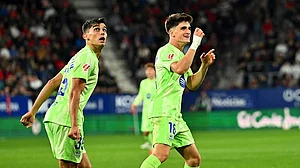 | Photo: AP/Miguel Oses : La Liga 2024-25, Osasuna and Barcelona: Barcelona's Pau Victor celebrates scoring his side's first goal