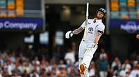 | Photo: AP/Tertius Pickard : England's captain Ben Stokes throws bat after loosing his wicket during the second Ashes cricket test match between Australia and England in Brisbane.