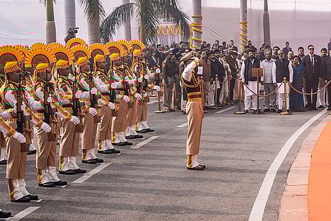 CISF personnel pay tribute to the martyrs of the 2001 Parliament attack during a ceremony to mark its 24th anniversary, at Samvidhan Sadan, in New Delhi.