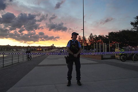 Police cordon off an area at Bondi Beach after a reported shooting in Sydney.