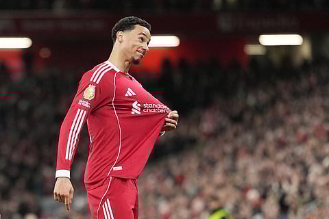 Liverpool's Hugo Ekitike celebrates after scoring his side's second goal during the English Premier League soccer match between Liverpool and Brighton and Hove Albion in Liverpool, England.