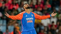 India Vs South Africa 3rd T20I: Varun Chakravarthy Eclipses Unique Wicket-Taking Record - Check Details | Photo: AP/Themba Hadebe : Ind vs SA 3rd T20I: India's Varun Chakravarthy celebrates the dismissal of South Africa's Reeza Hendricks
