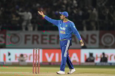 India's captain Suryakumar Yadav sets the field during the third T20 cricket match between India and South Africa in Dharamshala.