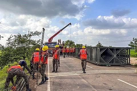 Indian Army's Engineer Task Force with Sri Lankan Army and Sri Lankan Road Development Authority during the Operation Sagar Bandhu, in Sri Lanka. 
