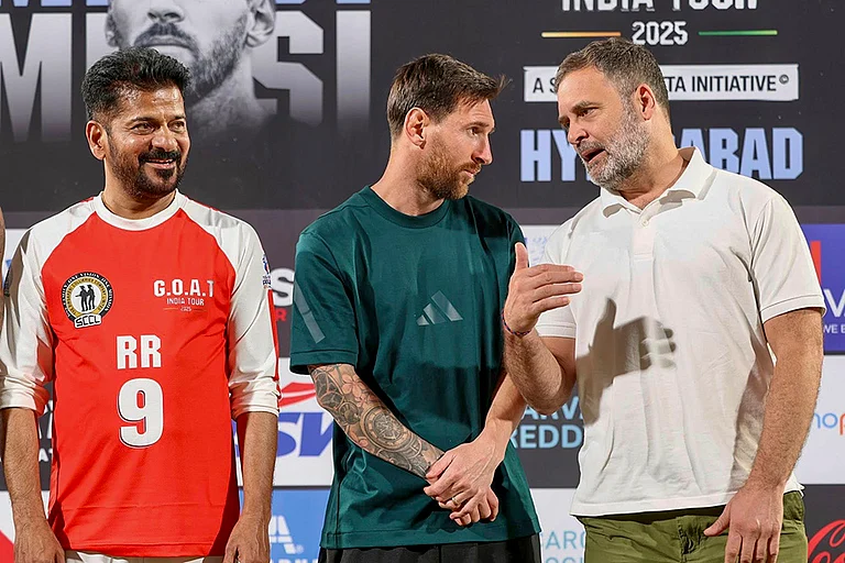 Leader of Opposition in the Lok Sabha Rahul Gandhi, Telangana Chief Minister Revanth Reddy with Argentine footballer and 2022 FIFA World Cup winning captain Lionel Messi during an event as part of the 'GOAT India Tour 2025', in Hyderabad. - | Photo: AICC via PTI