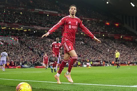Liverpool's Hugo Ekitike celebrates after scoring his side's second goal during the English Premier League soccer match between Liverpool and Brighton and Hove Albion in Liverpool, England.