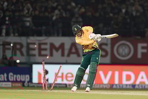 South Africa's Corbin Bosch bowled out by India's Shivam Dube during the third T20 cricket match between India and South Africa in Dharamshala.
