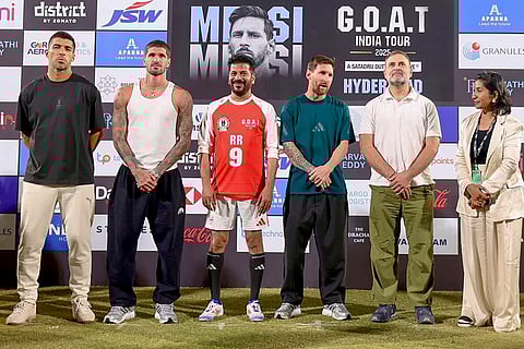 Leader of Opposition in the Lok Sabha Rahul Gandhi and Telangana Chief Minister Revanth Reddy with Argentine footballer and 2022 FIFA World Cup winning captain Lionel Messi and his Inter Miami teammates Rodrigo De Paul and Luis Suarez during an event as part of the 'GOAT India Tour 2025', in Hyderabad. 