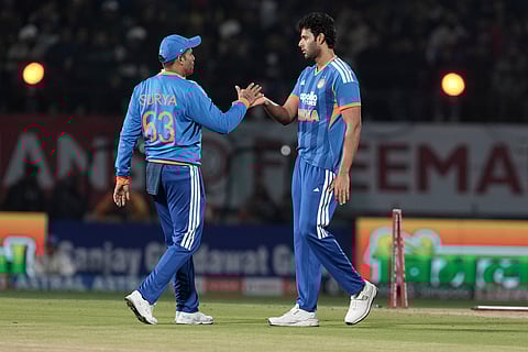 India's captain Suryakumar Yadav, left, and Shivam Dube celebrate the wicket of South Africa's Corbin Bosch during the third T20 cricket match between India and South Africa in Dharamshala.