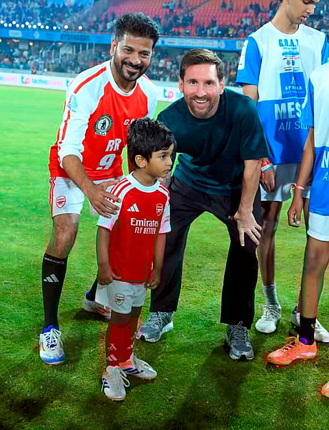 Telangana Chief Minister Revanth Reddy with Argentine footballer and 2022 FIFA World Cup winning captain Lionel Messi and others during an event as part of the second leg of 'GOAT India Tour 2025', in Hyderabad.