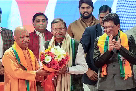 Union Minister Piyush Goyal (right), Uttar Pradesh Chief Minister Yogi Adityanath (left) with newly elected BJP state president Pankaj Chaudhary (centre) during the 'Sangathan Parv' event, in Lucknow.