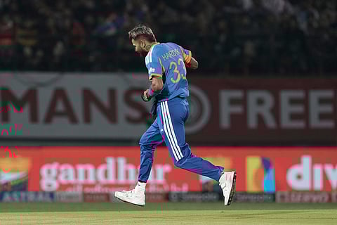 India's Hardik Pandya celebrates the wicket of South Africa's Tristan Stubbs during the third T20 cricket match between India and South Africa in Dharamshala.