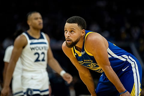 Golden State Warriors guard Stephen Curry (30) looks up during the second half of their NBA basketball game against Minnesota Timberwolves in San Francisco.