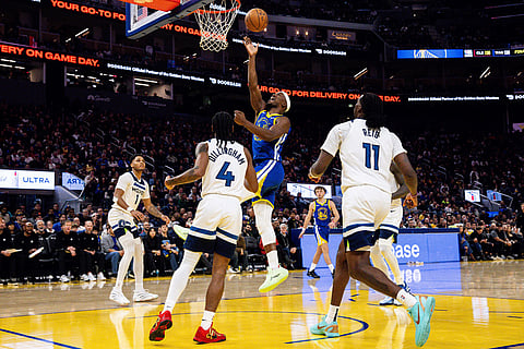 Golden State Warriors forward Jimmy Butler III (10) drives for a layup during the second half of his NBA basketball game against the Minnesota Timberwolves in San Francisco.