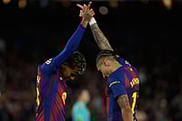 English Premier League: Raphinha Scores Twice As Barcelona Beat Osasuna 2-0 In Front Of Home Support | Photo: AP/Joan Monfort : Barcelona's Raphinha and Lamine Yamal celebrate after a goal during a La Liga soccer match between Barcelona and Osasuna in Barcelona, Spain.