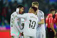 | Photo: AP/Miguel Oses : Real Madrid's Kylian Mbappe, centre, celebrates with Jude Bellingham after the Spanish La Liga soccer match between Alaves and Real Madrid in Vitoria-Gasteiz, Spain.