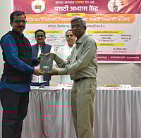 Marathi Abhyas Kendra  : Dr Prakash Pawar associated with Marathi Abhyas Kendra felicitated Santosh Surve - one of the panelist. 