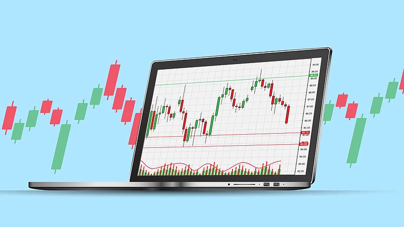 Stock market candlestick chart on a laptop