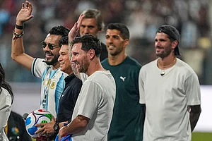 | Photo: PTI/Kunal Patil : Cricket legend Sachin Tendulkar with Argentine footballer and 2022 FIFA World Cup winning captain Lionel Messi and his Inter Miami teammates Rodrigo De Paul and Luis Suarez during an event as part of the 'GOAT India Tour 2025', at the Wankhede Stadium, in Mumbai.