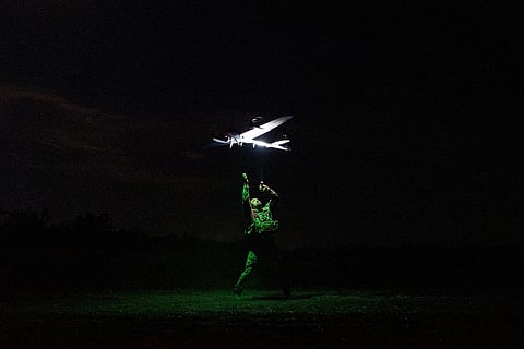 A Ukrainian serviceman with the Safari Unit of the Liut Brigade launches a reconnaissance drone at the frontline in the Donetsk region, Ukraine, Sept. 6, 2025. 