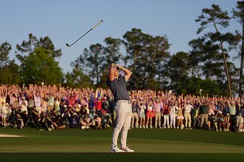 Rory McIlroy, of Northern Ireland, reacts after winning in a playoff against Justin Rose after the final round at the Masters golf tournament, April 13, 2025, in Augusta, Georgia.