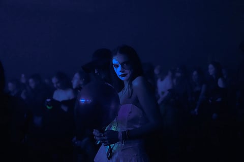 A woman in costume attends a Halloween rave in Kyiv, Ukraine, Oct. 25, 2025. 
