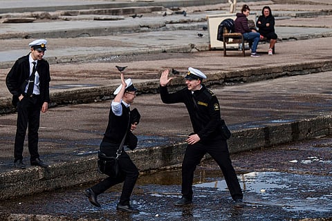 Cadets greet each other at the Lanzheron beach in Odesa, Ukraine, March 26, 2025. 
