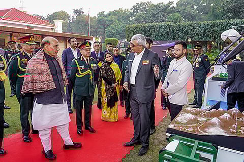 Defence Minister Rajnath Singh with Chief of Army Staff General Upendra Dwivedi and others during a reception on the eve of 'Vijay Diwas', at Army House, in New Delhi. 