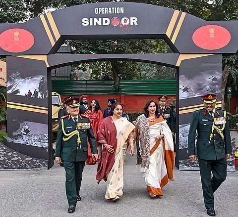 Chief of Defence Staff General Anil Chauhan, left, with his wife Anupama, second left and others during the Vijay Diwas Reception, at Army House in New Delhi. 